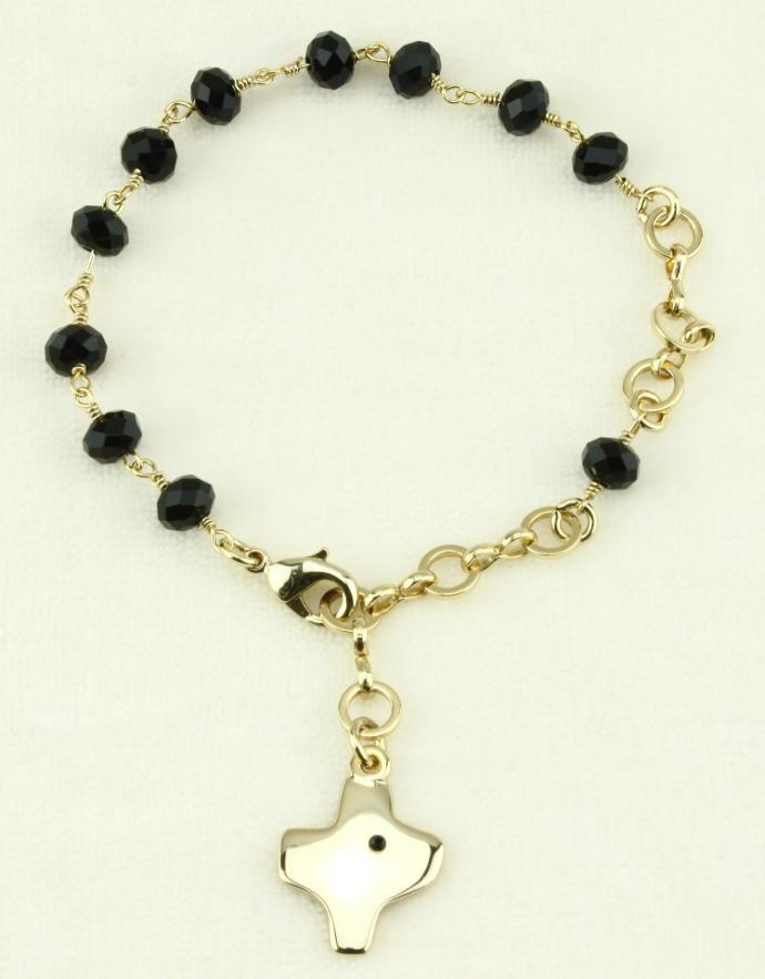 Armband - verguld metaal met zwarte kristalletjes (Ø8mm)