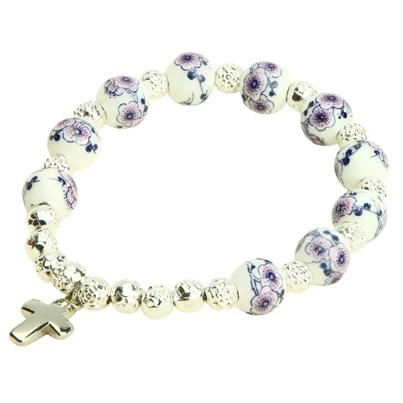 Armband/tientje/elastisch - porcelein/assorti - 10mm/kruisje